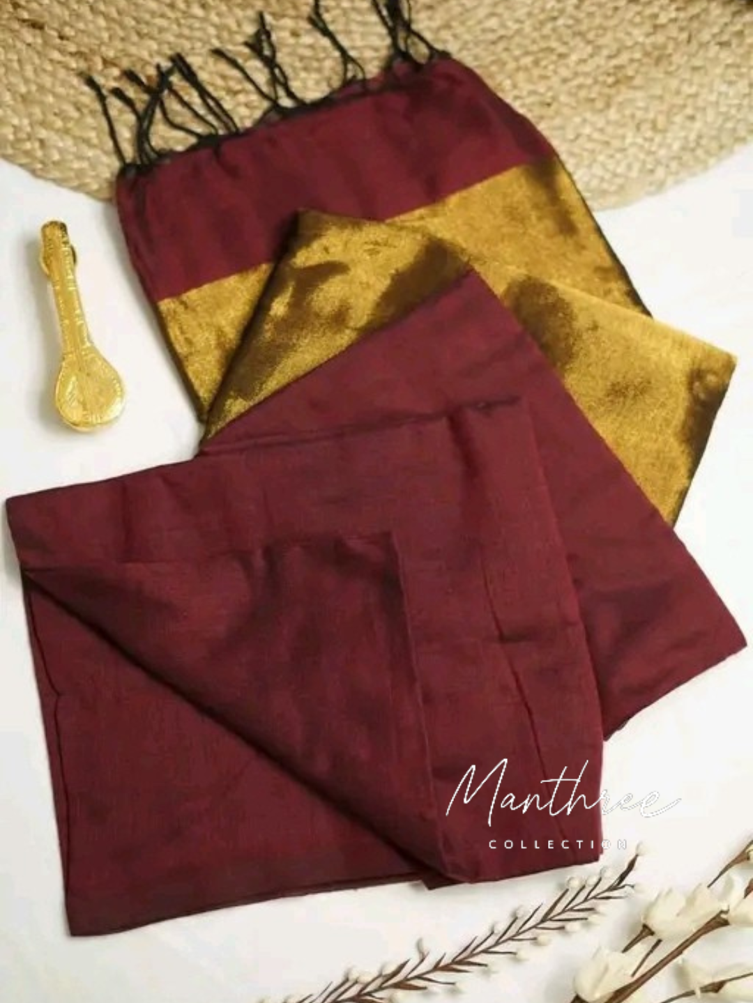 Nayanthara maroon cotton Tissue zari pallu with gold border blouse