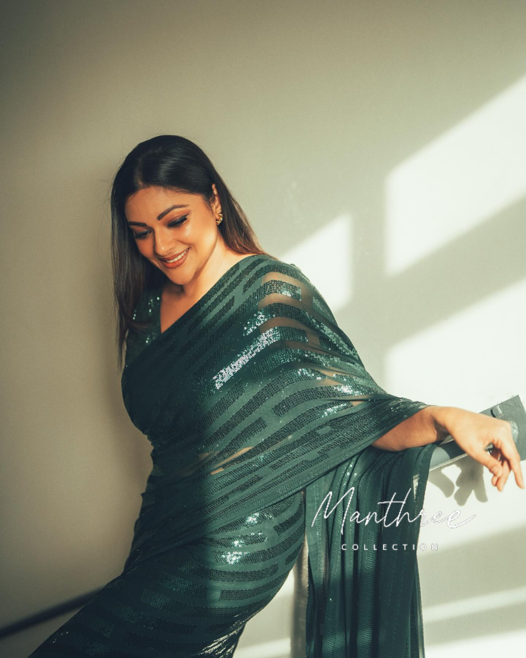 Abhirami green sequin saree