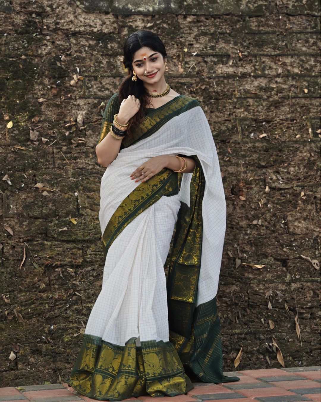 Green border onam saree