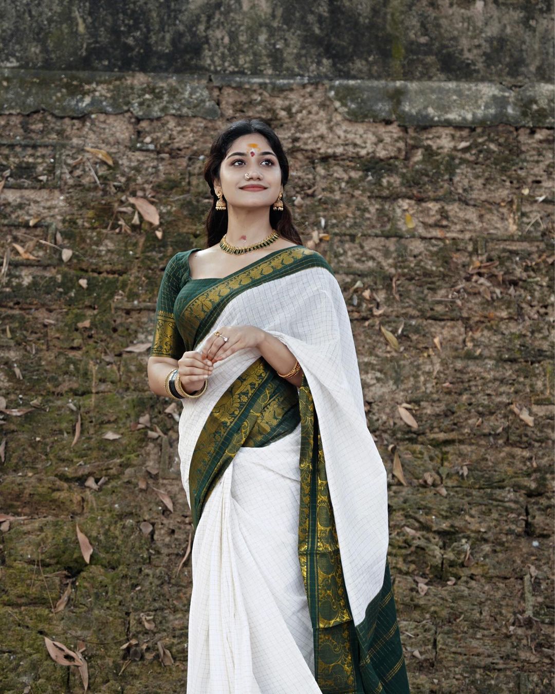 Green border onam saree