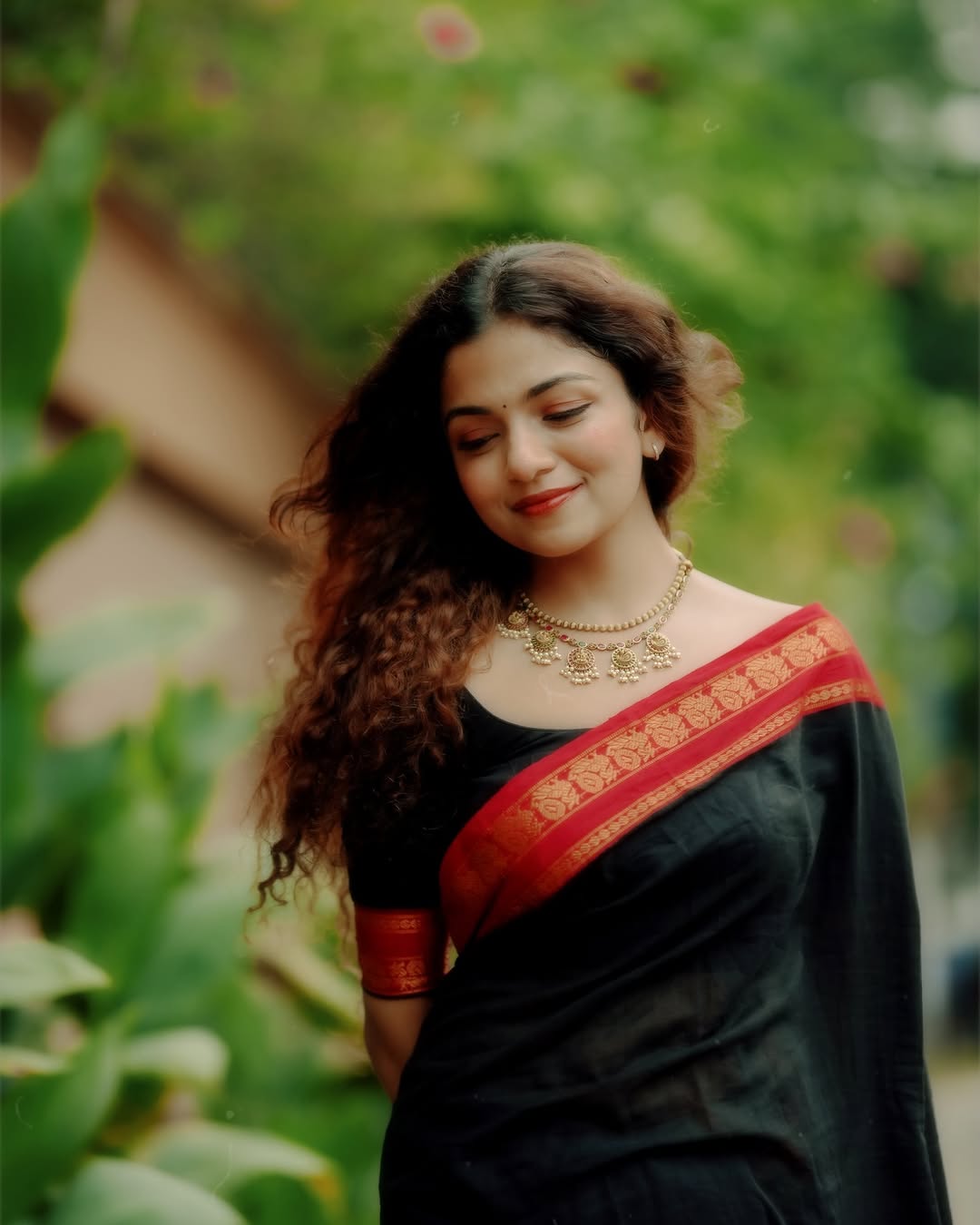 Manthree Kuthampully Handloom Black Cotton Saree with Peacock Motifs Border