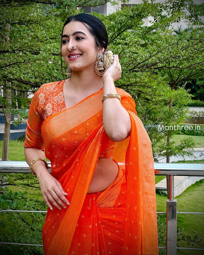Trending celebrity orange designer saree