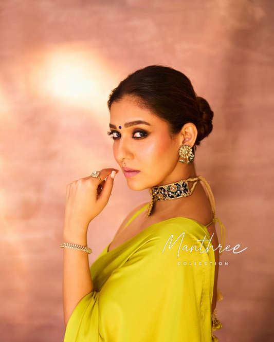 Nayanthara yellow satin saree