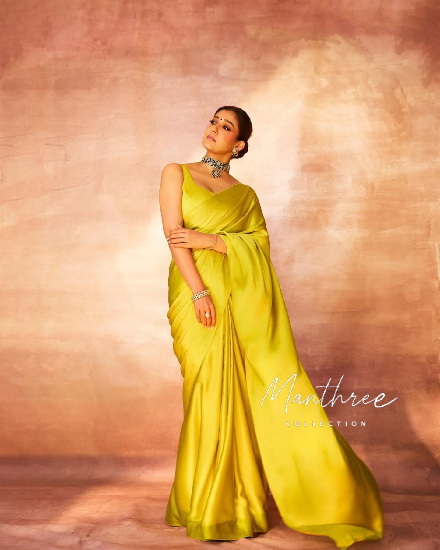 Nayanthara yellow satin saree