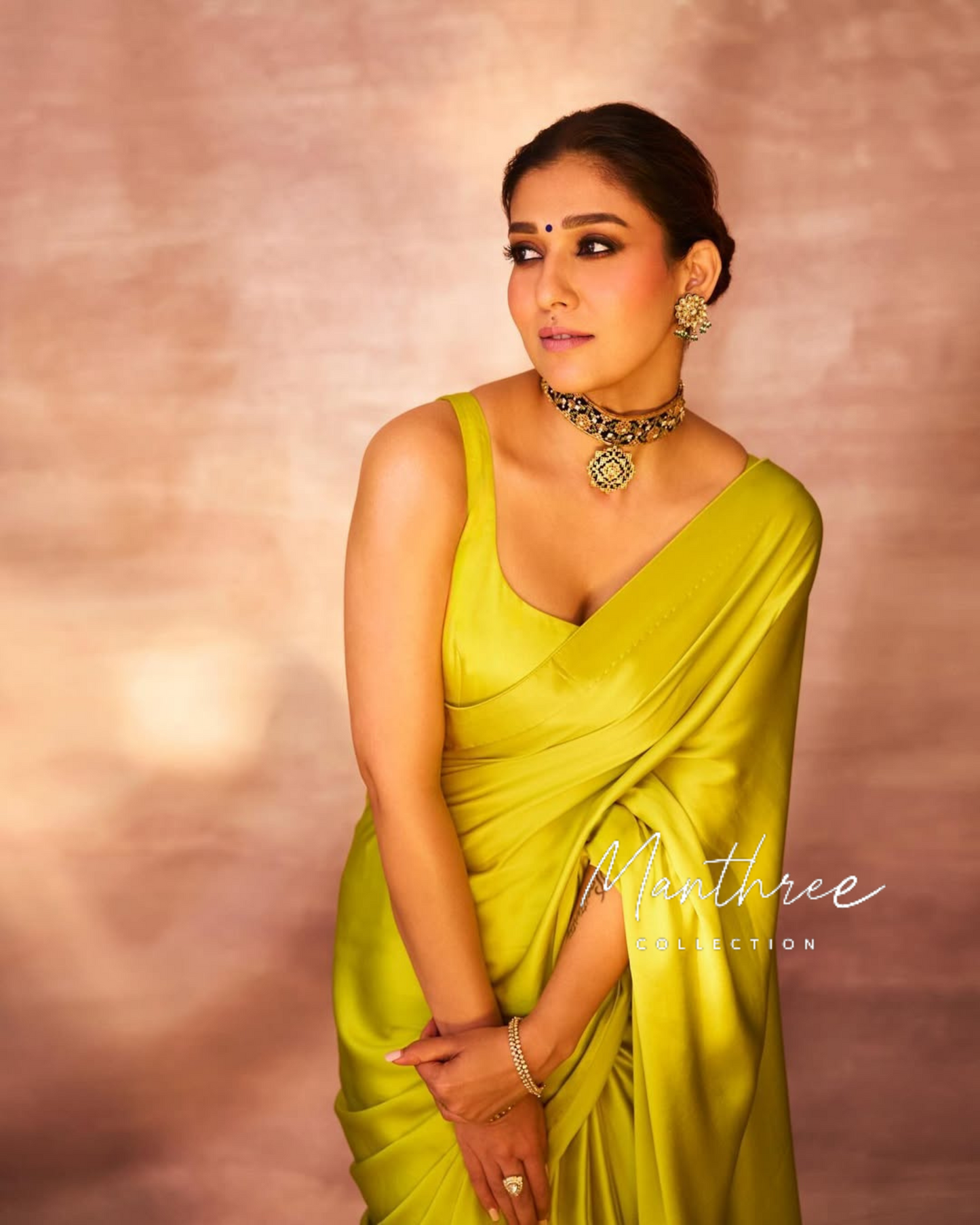 Nayanthara yellow satin saree