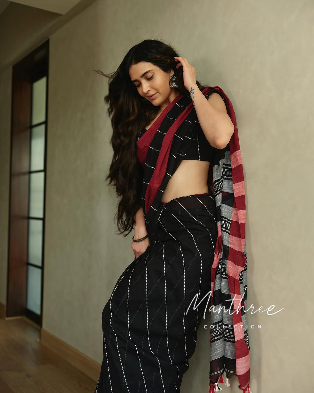 Karishma Tanna black white stripe cotton saree