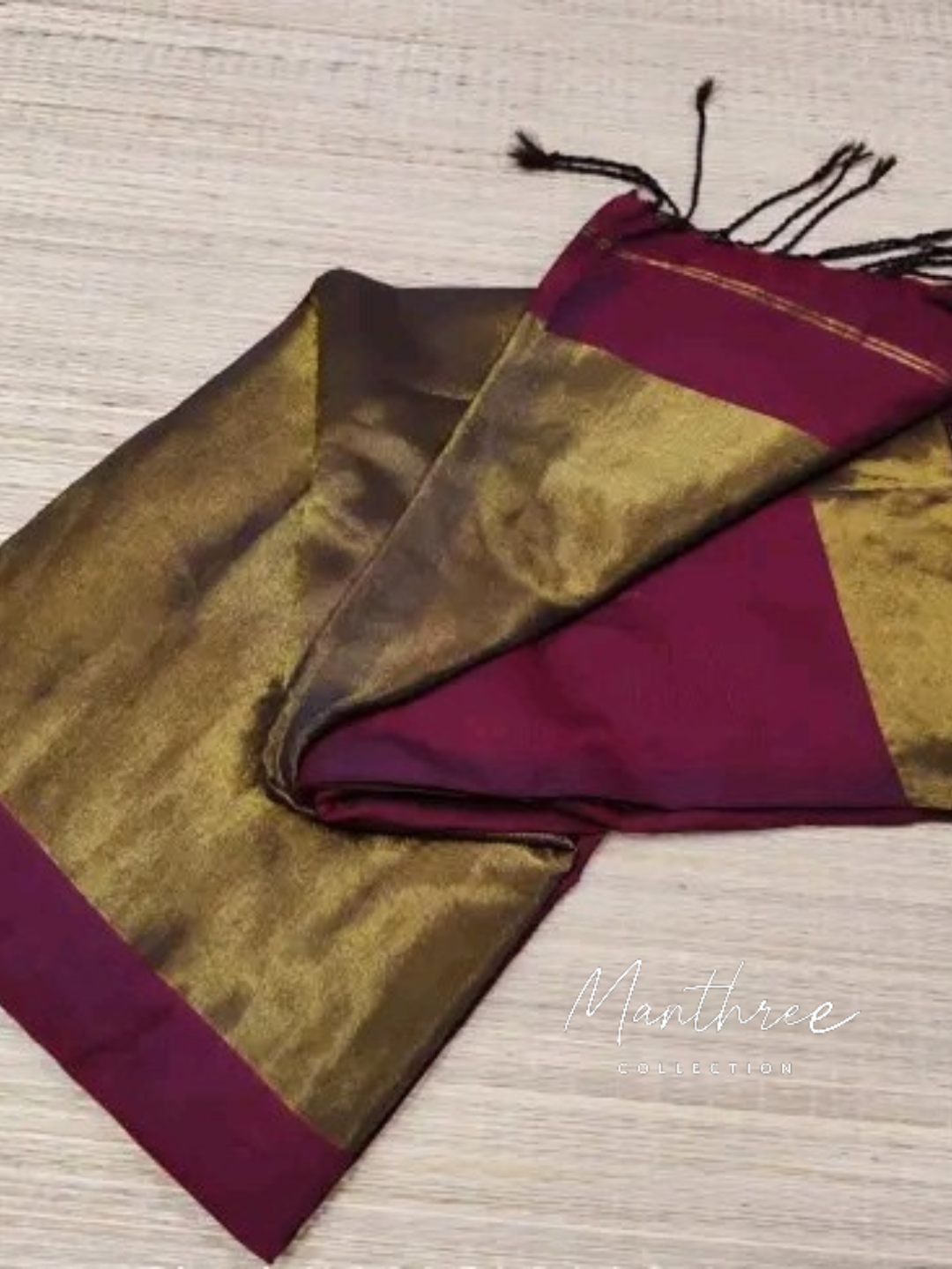 Nayanthara maroon cotton Tissue zari pallu with gold border blouse